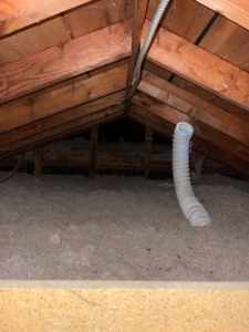 Attic view directly into the house with no firewall. Firewall missing.